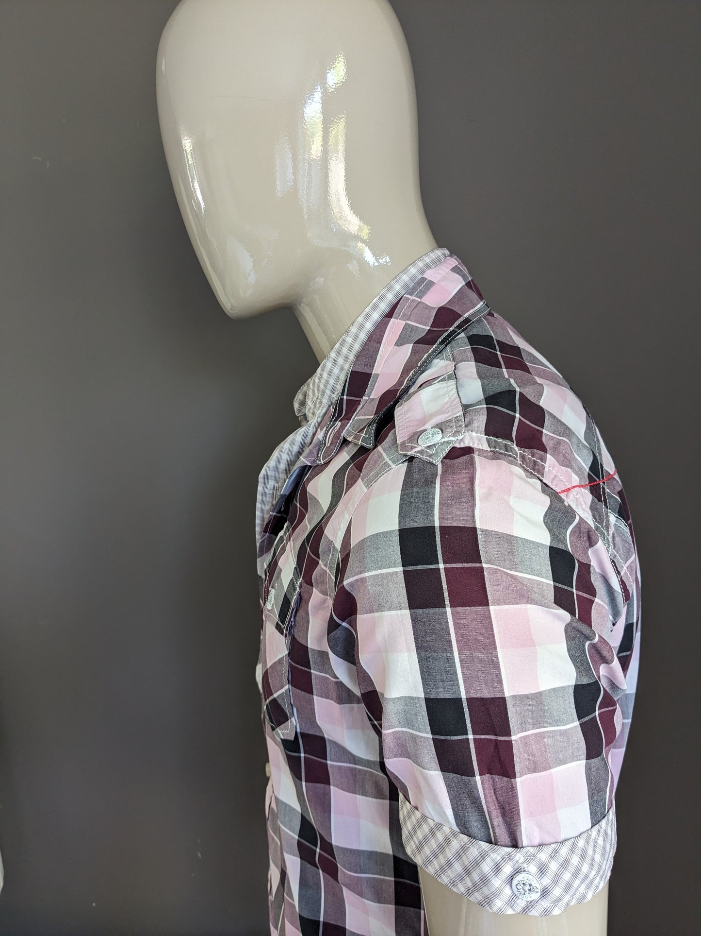 Cast Iron Shirt short sleeve and double collar. Purple pink black and white checkered. Size XL.