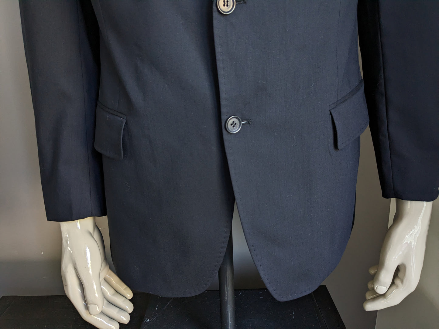 Ben Barton woolen jacket. Dark blue colored. Size 25 (50 / m).