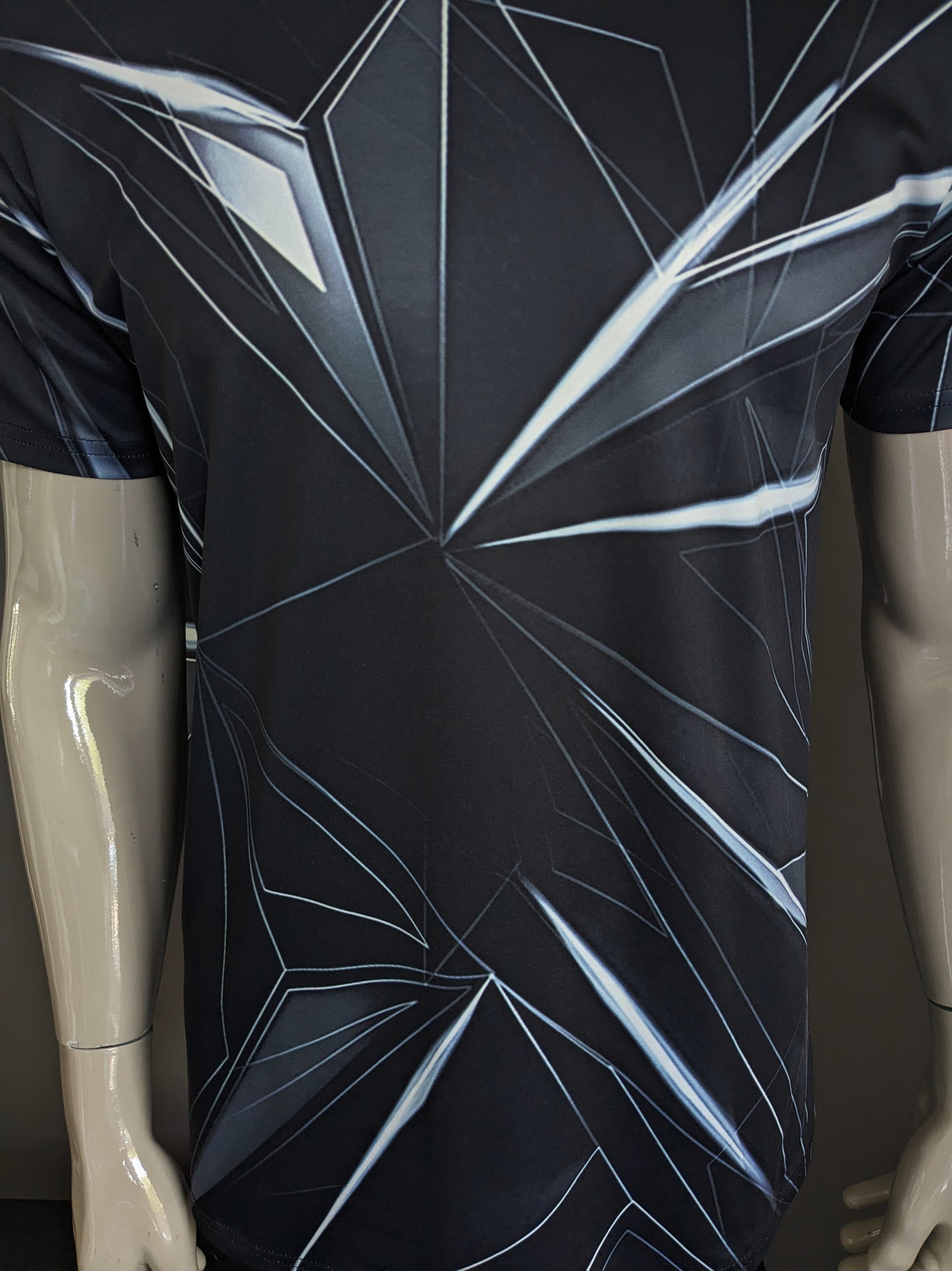 Geometric print shirt. Zwart Wit gekleurd. Maat M. stretch.