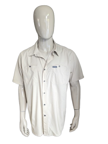 Wrangler outdoor shirt short sleeve. Beige colored. Size XL. Regular fit.