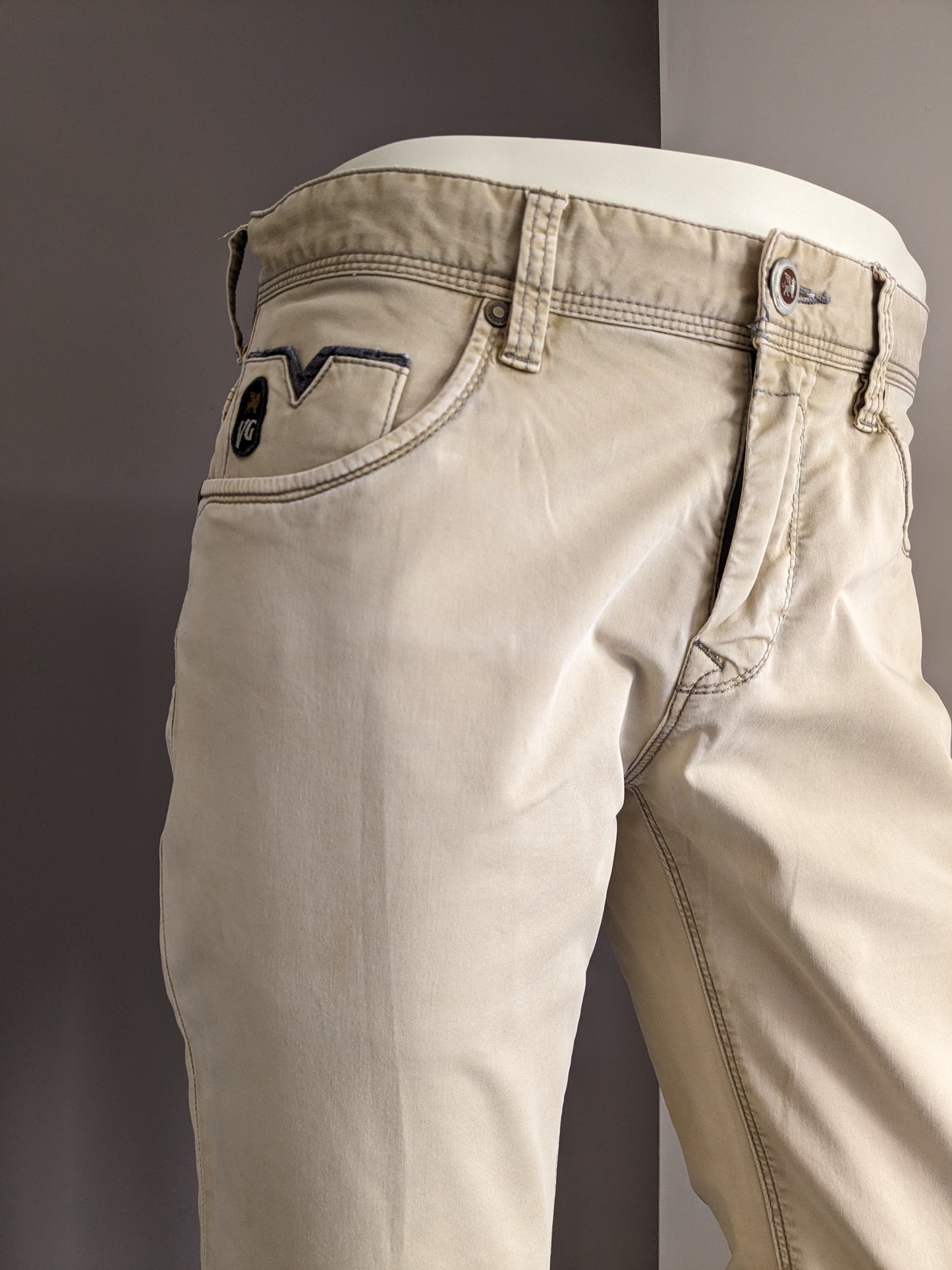 Vanguard pants. Beige colored. Size W31 - L32.