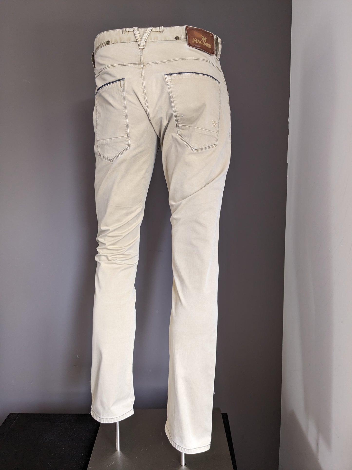Pantalones de vanguardia. Color beige. Tamaño W31 - L32.