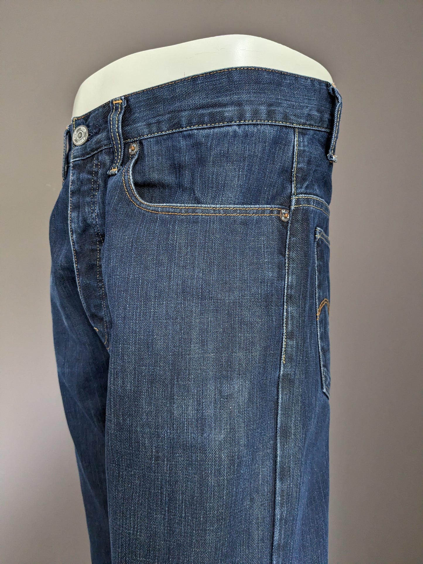 Jeans bruts G-Star. Couleur bleu foncé. Taille W31 - L32.