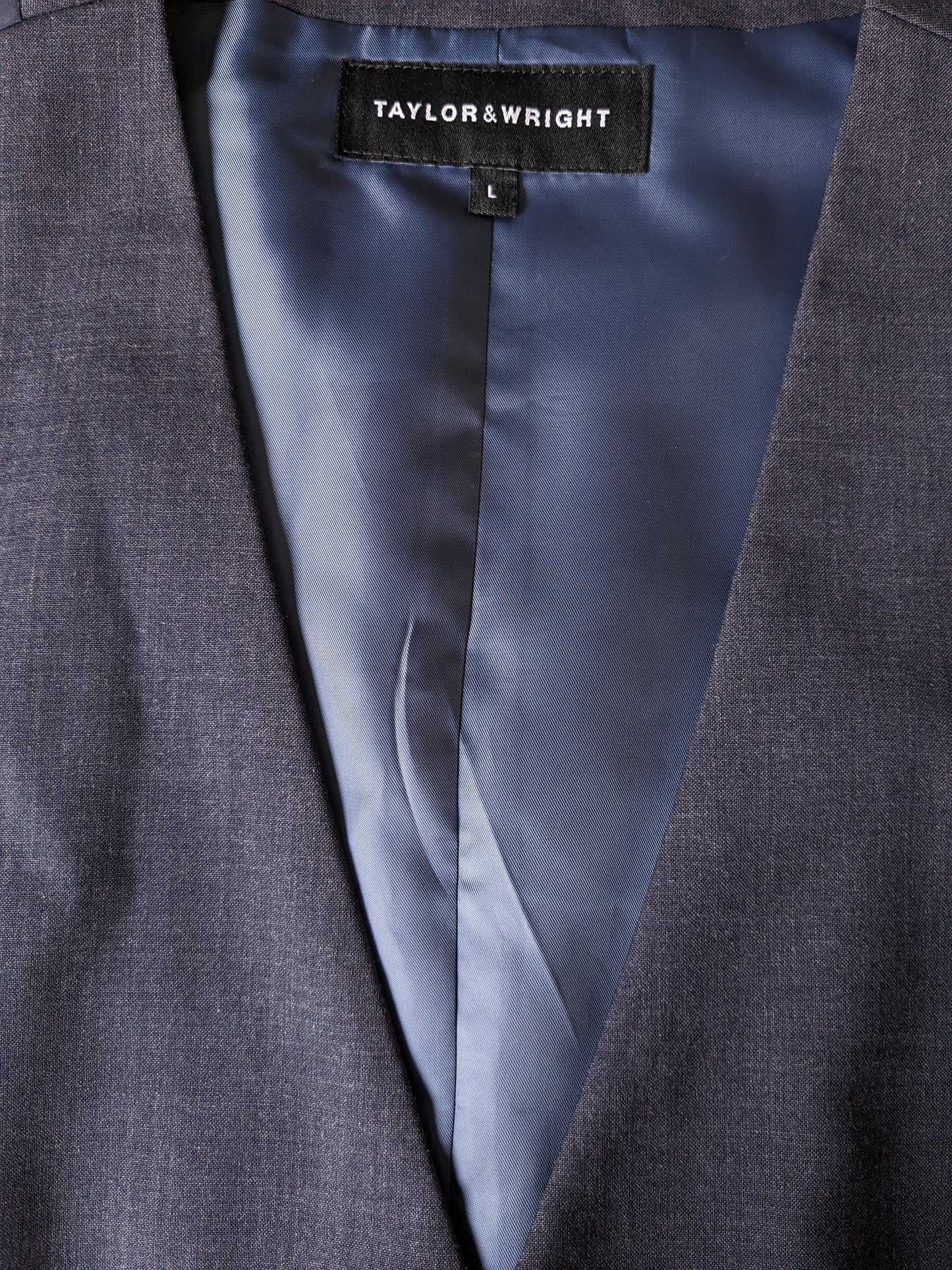 Taylor & Wright woolen waistcoat. Blue motif. Size L. #319.