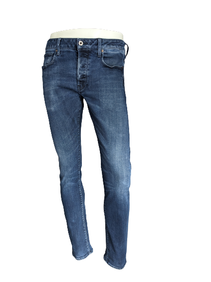 G-Star RAW Slim jeans. Donker Blauw gekleurd. Maat W34 - L34.