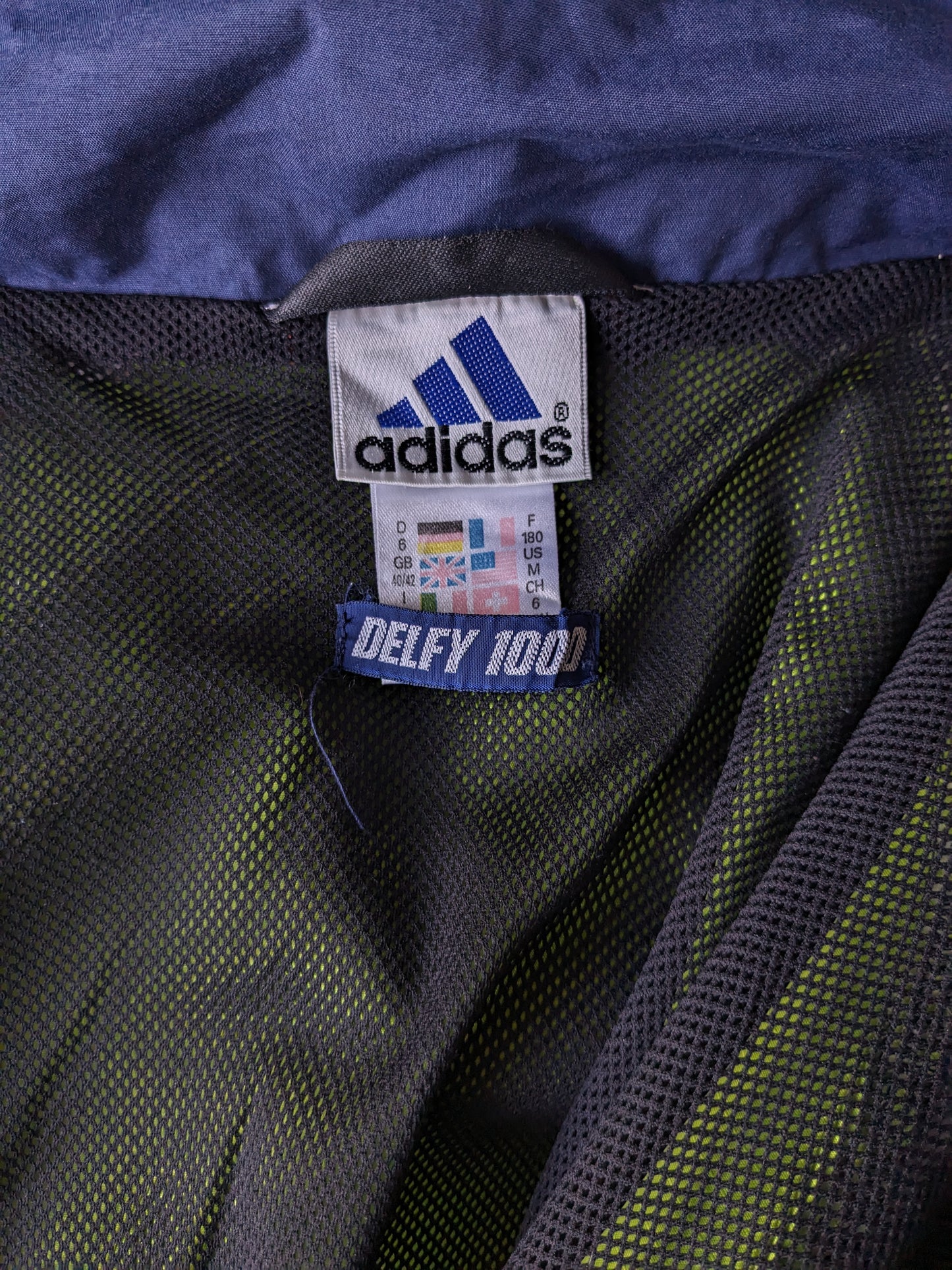Adidas "Delfi 1000" veste / prise. Couleur bleu jaune. Taille xl.