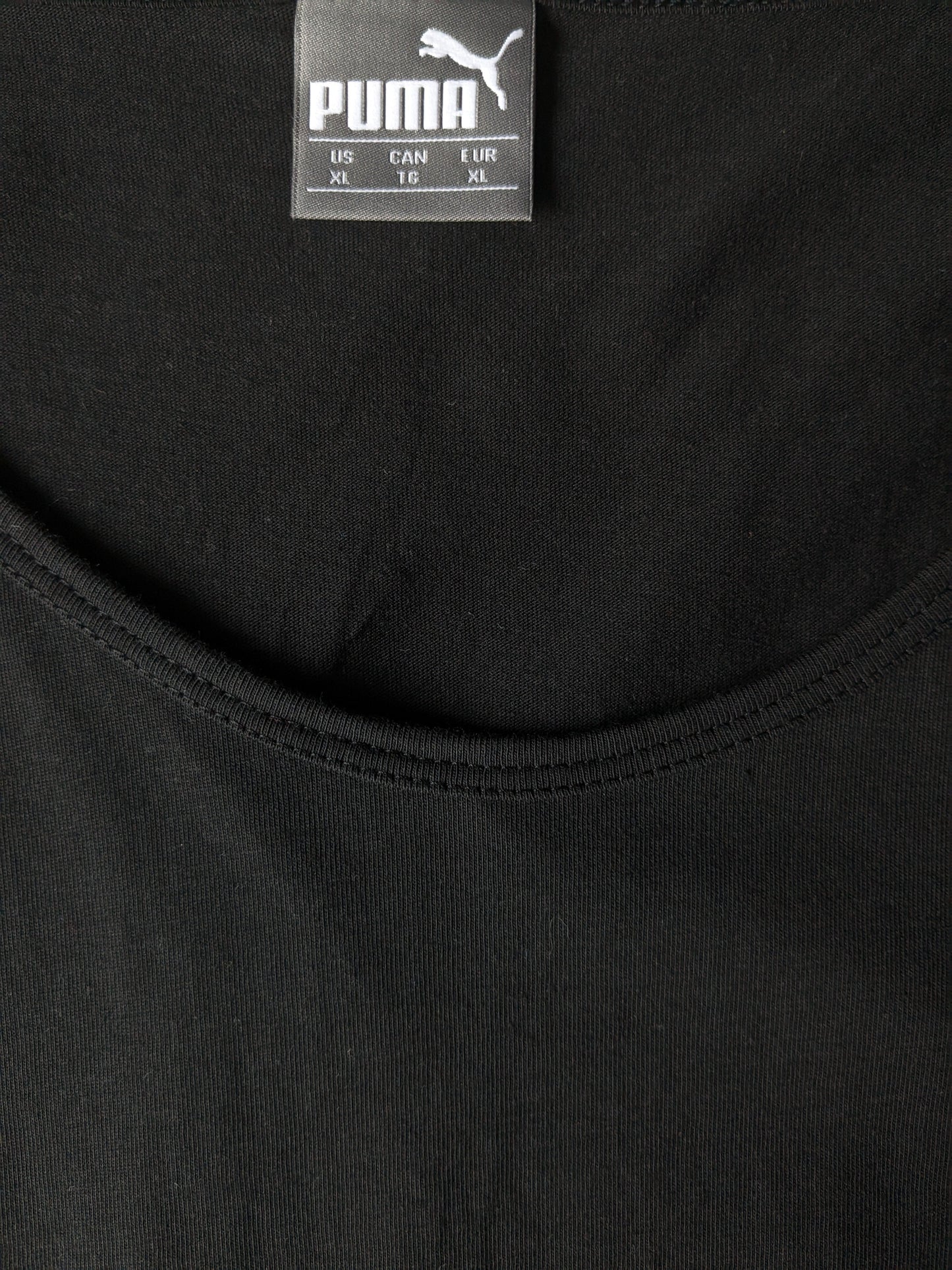 Puma sporty singlet. Black with print. Size XL.