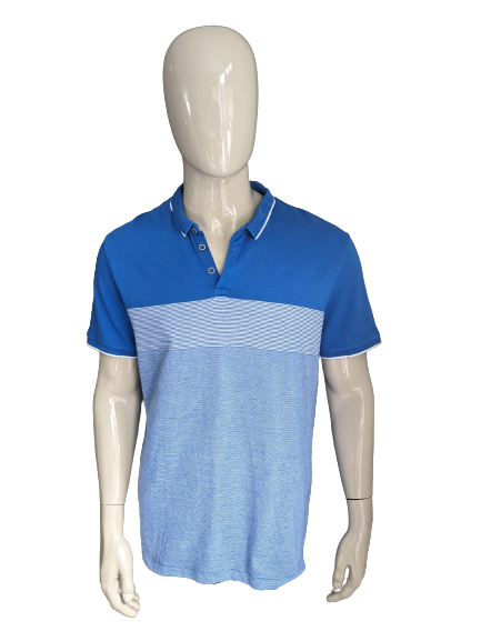 Polo F&F. De couleur bleu blanc. Taille XL.