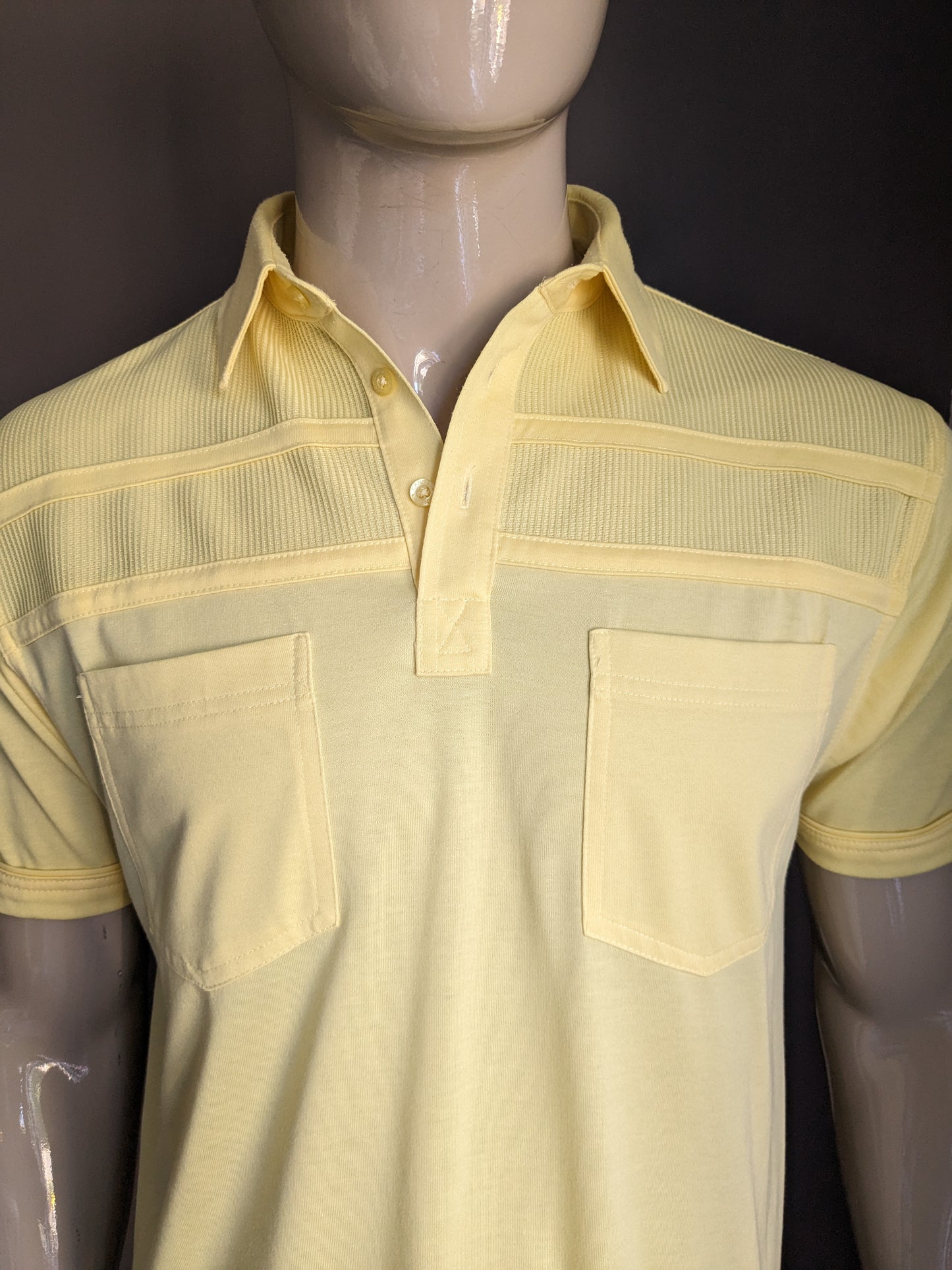 Vintage Canda Polo with elastic band. Yellow colored. Size M.