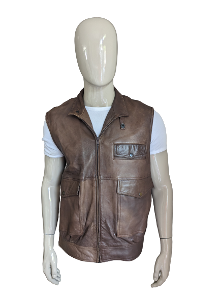 Exquisit Learning Body Warmer. Brown colored. Size 54 / L. with 1 inner pocket.