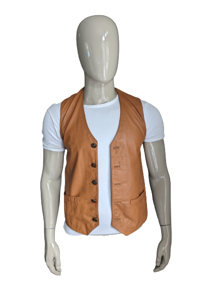 Vintage C&A beef leather double -sided waistcoat. Nice buttons. Brown colored. Size S.