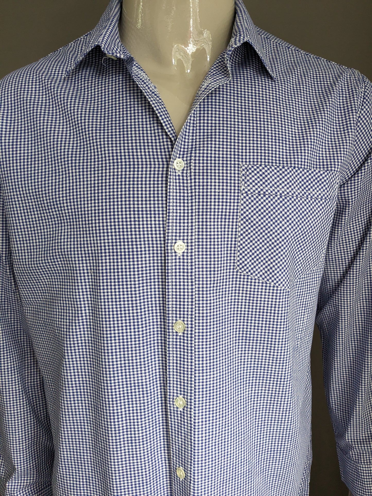 Camicia vintage degli anni '70. Motivo a scacchi bianchi blu. Taglia L.