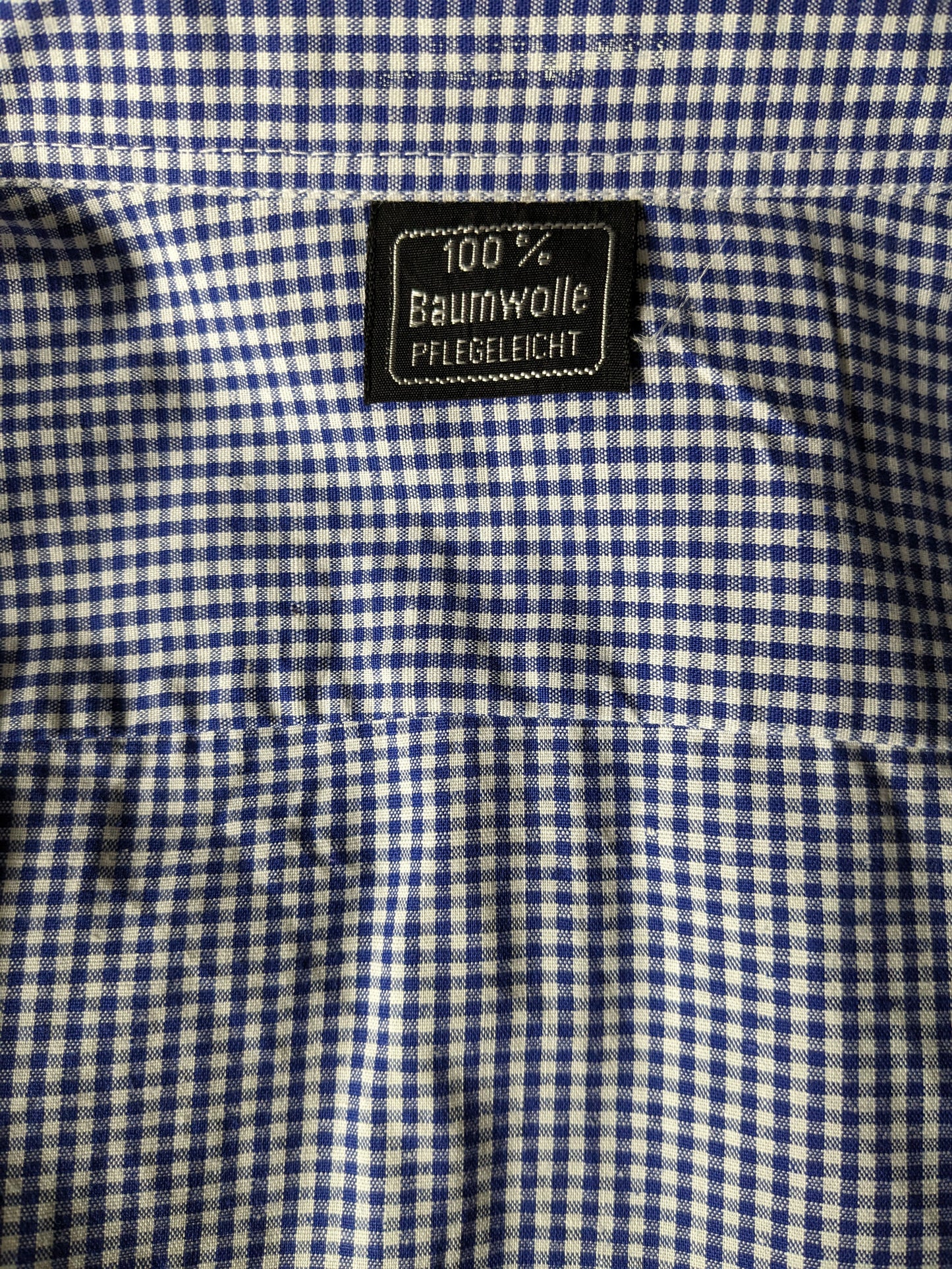 Vintage 70's shirt. Blue white checkered motif. Size L.