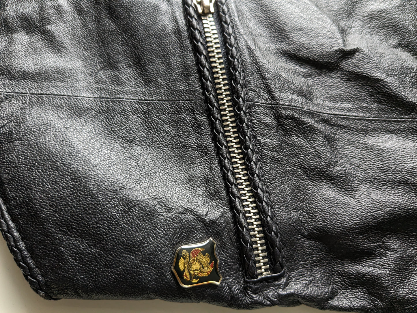 Harley Davidson Leather waistcoat. Black with beautiful braided edges and beautiful applications. Black. Size XXS.