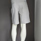 Colombia Sportswear korte broek met zakken en verstelbare taille. Beige gekleurd. Maat W30.