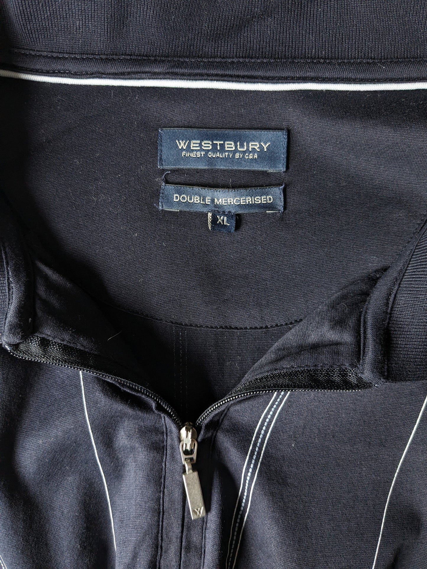Westbury Vintage polo met elastische band en rits. Donker Blauw Wit gestreept. Maat XL.