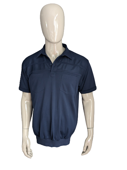 Vintage Canda Polo with elastic band. Dark blue colored. Size XL.