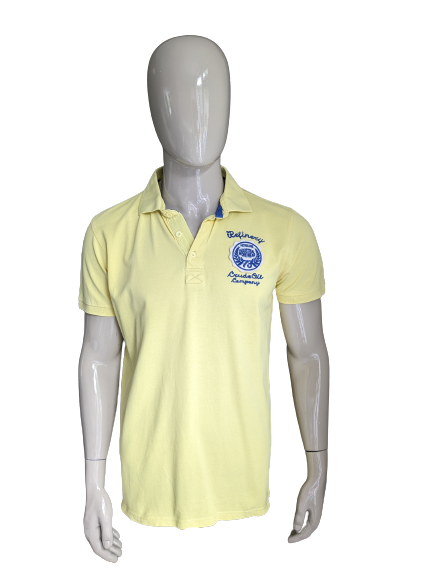 Petrol Polo. Yellow with application. Size XL.