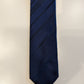 Thomas Nash polyester stropdas. Blauw glanzend motief
