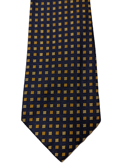La cravatta di seta inglese con cappuccio. Motivo giallo blu.