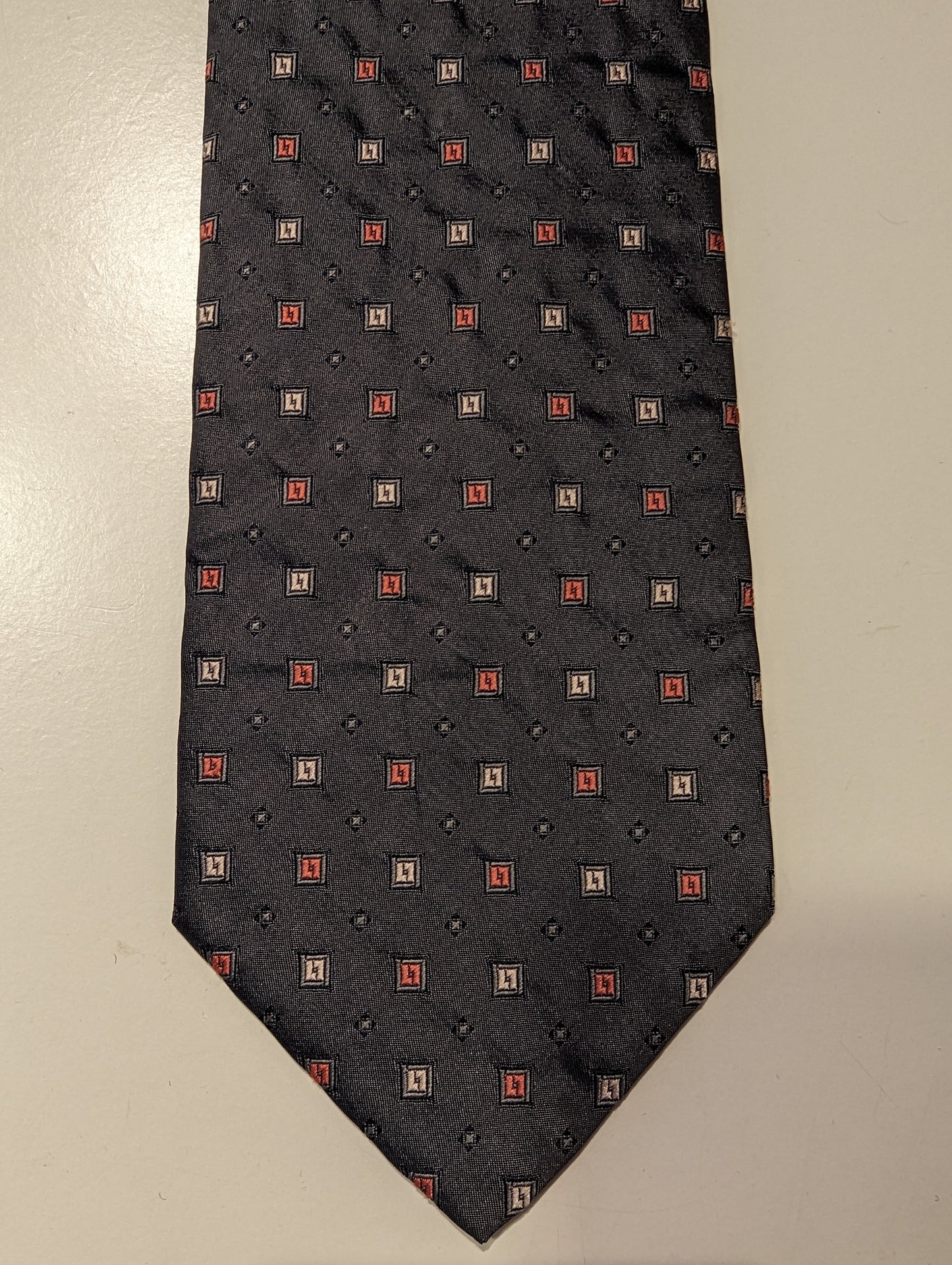 Selección vintage corbata de seda. Motivo gris brillante.