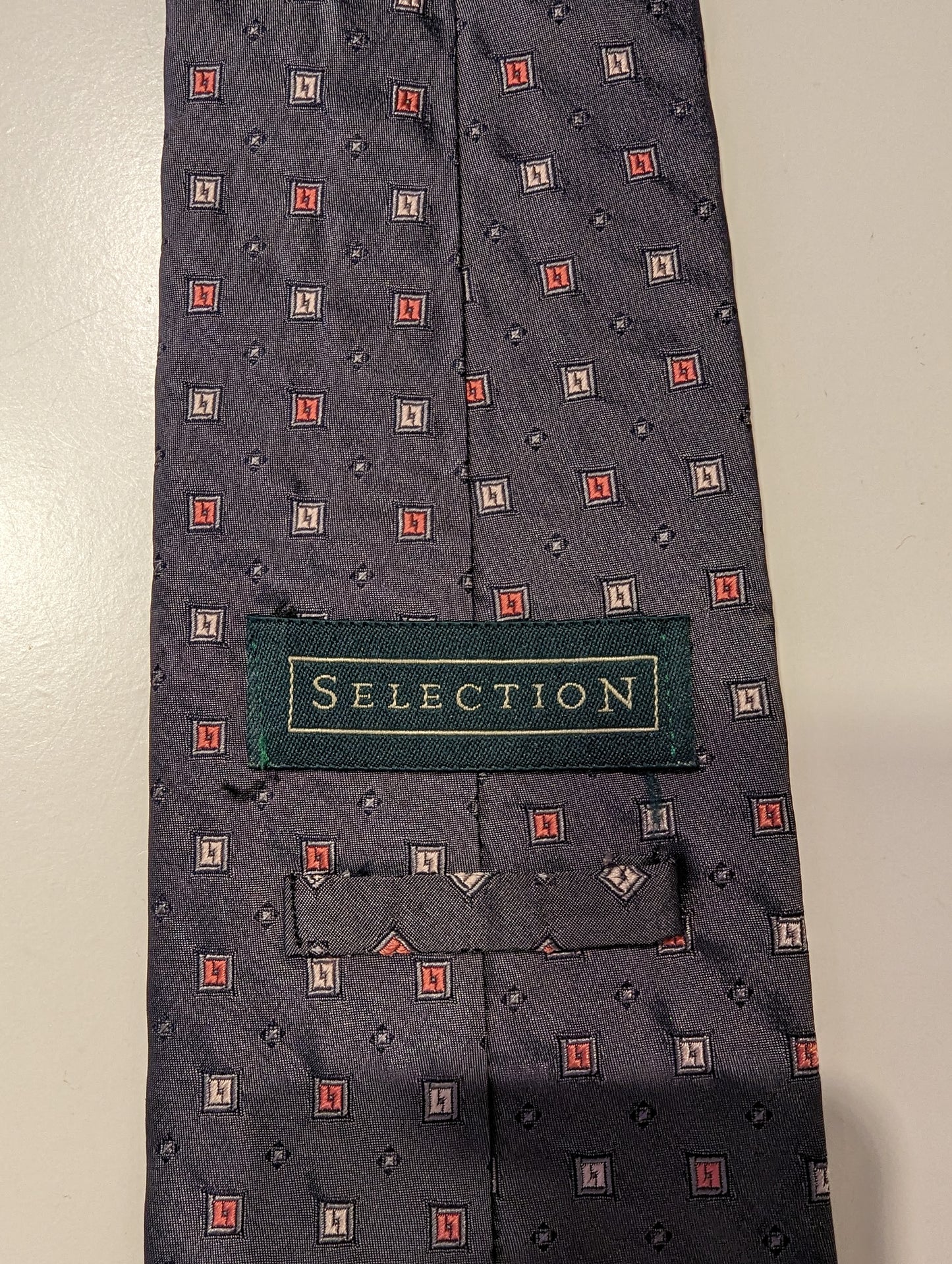 Vintage Selection zijde stropdas. Grijs glanzend motief.