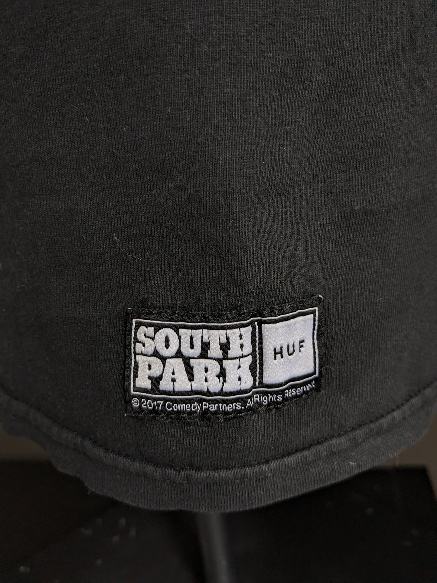 Camisa de Huf South Park. Negro con estampado de color. Talla M.