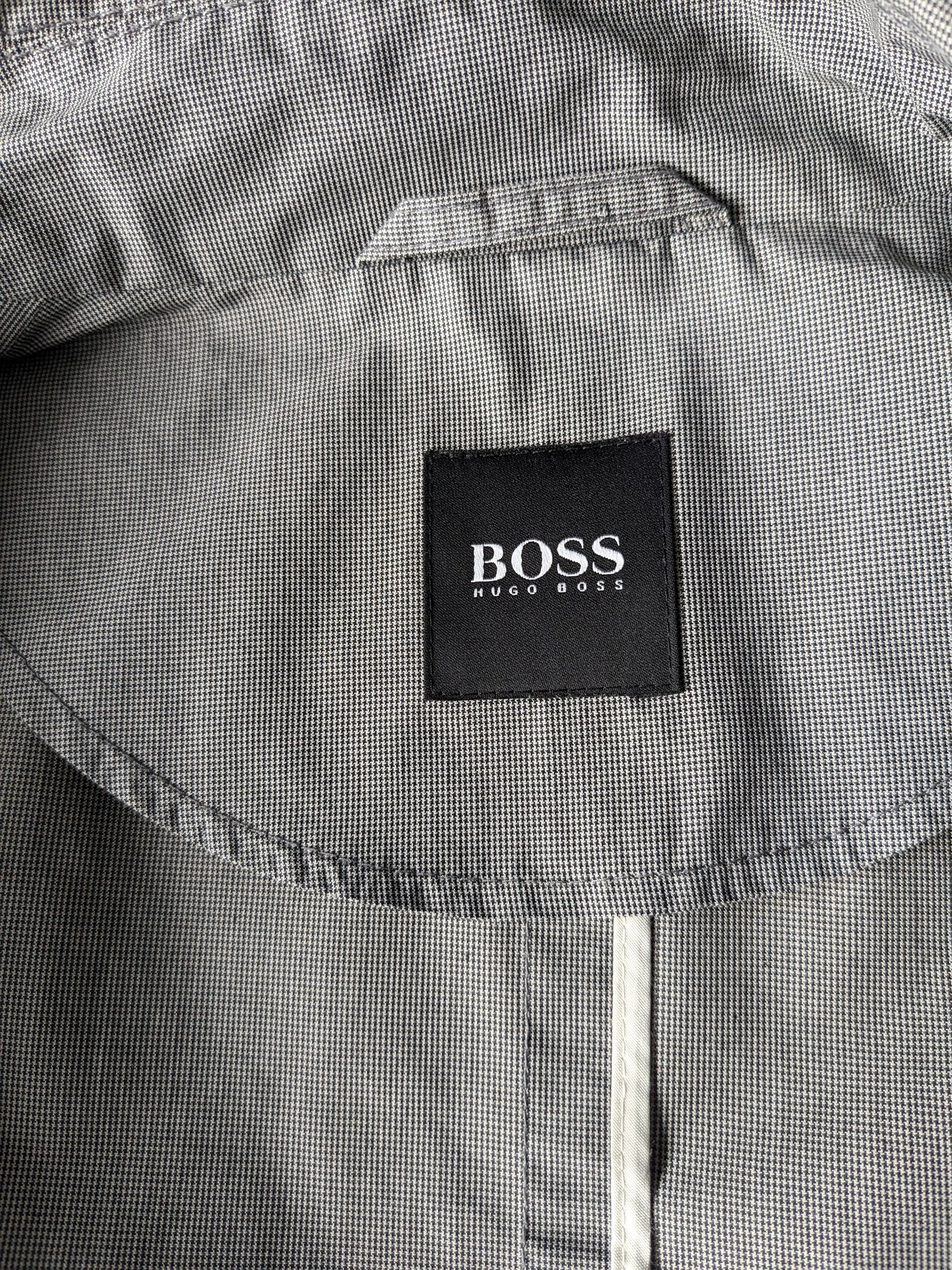 Boss Hugo Bus tra giacca / media lunghezza. Motivo in bianco e nero. Taglia 50 / M.