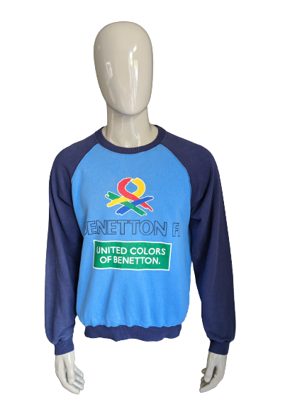 Einzigartiges Vintage-Benneton-Formel-Racing-1-Trikot. Blau mit Aufdruck. Größe M/L.