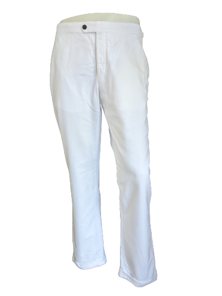 Suit Supply turn-up trousers with suspender applications. Colored white. Size 27 (54/L)