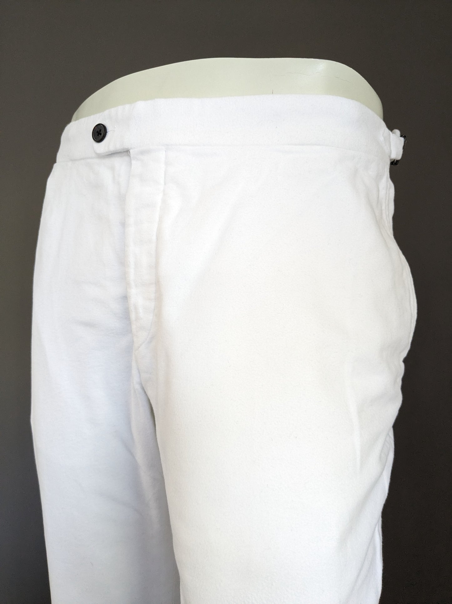 Suit Supply turn-up trousers with suspender applications. Colored white. Size 27 (54/L)