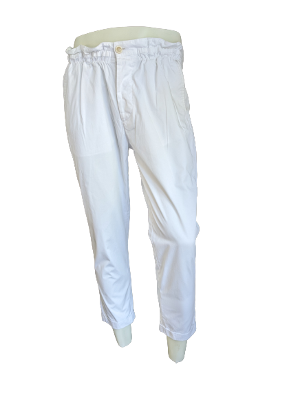 Dsquared2 trousers with elastic waistband. Colored white. Size 48 / M.