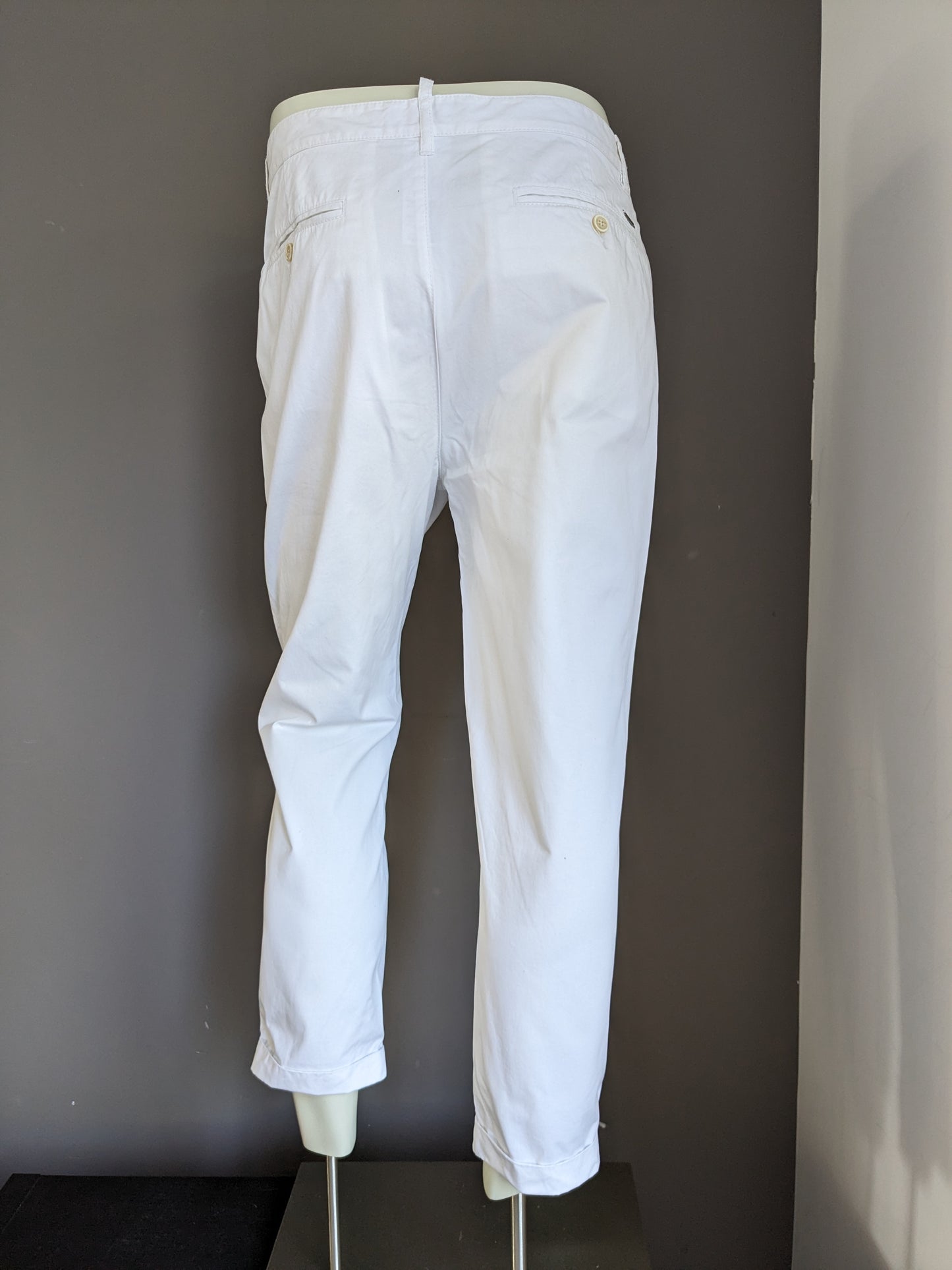 Pantalone Dsquared2 con elastico in vita. Di colore bianco. Taglia 48.M.