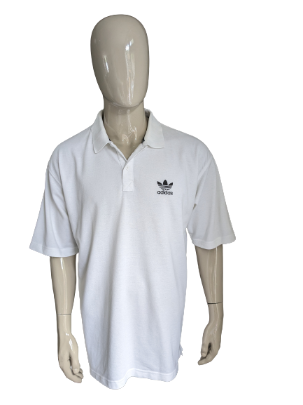 Vintage Adidas Original polo. White colored. Size 2XL/XXL.