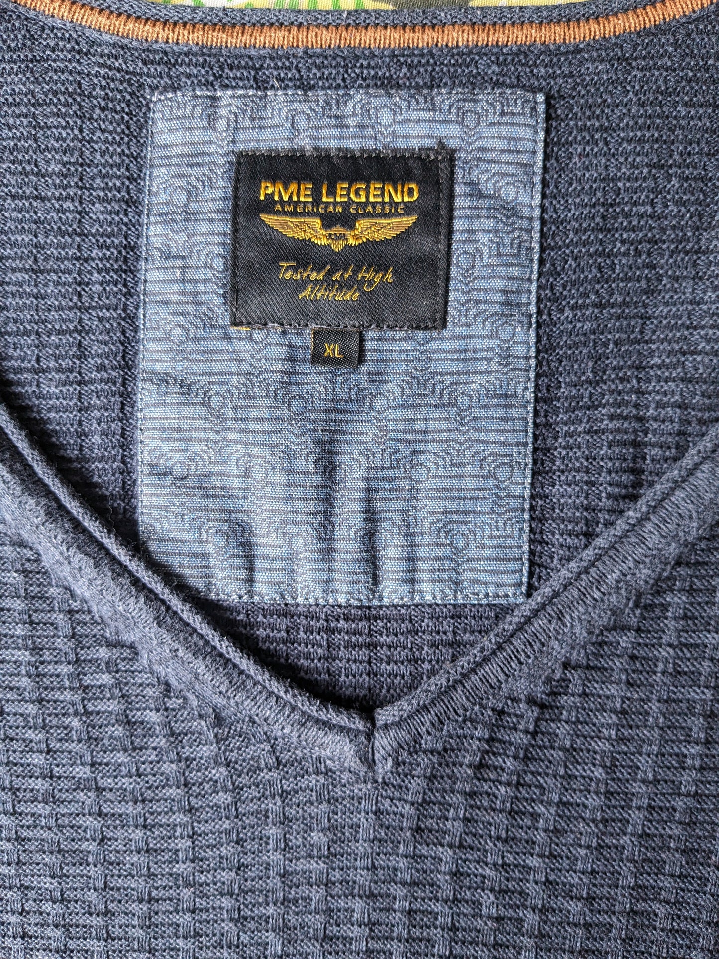 Jersey PME Legend con cuello en pico. Motivo táctil azul oscuro. Talla XL.