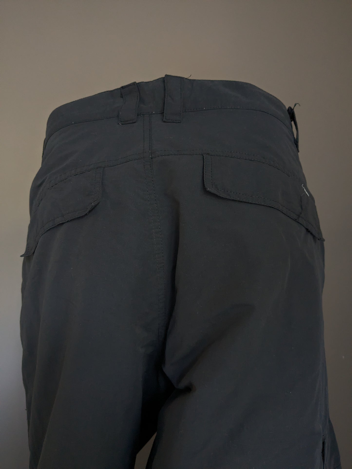 Pantalon extérieur Tenson. Doublure chaude douce. Couleur noire. Taille 54 / L.