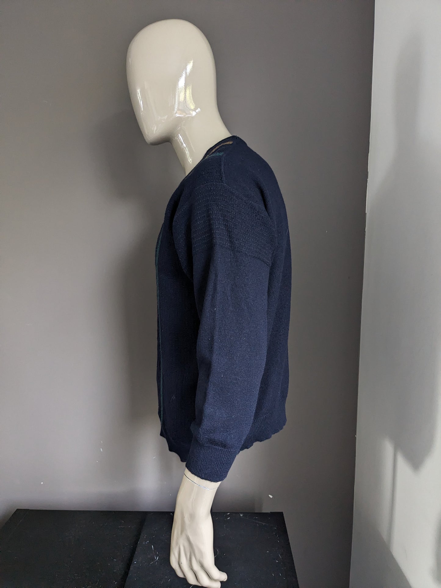 Vintage Maselli Wolle-Pullover mit V-Ausschnitt. Dunkelblau mit gelb rotgrün blauem Motiv. Größe L.