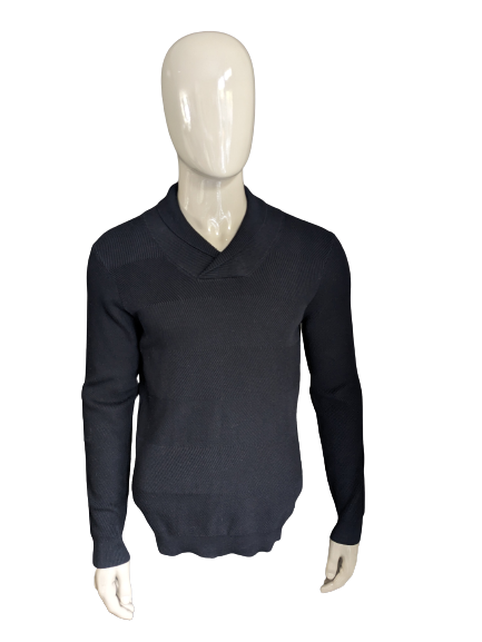 Blue industry sweater with sporty collar. Black rib motif. Size M.