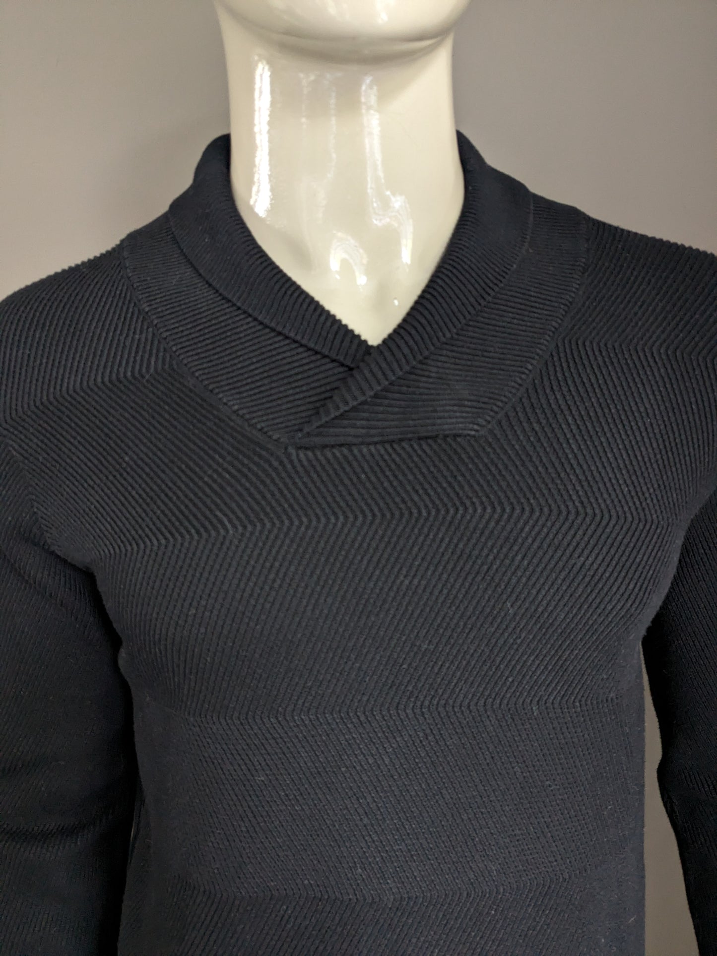 Blue industry sweater with sporty collar. Black rib motif. Size M.