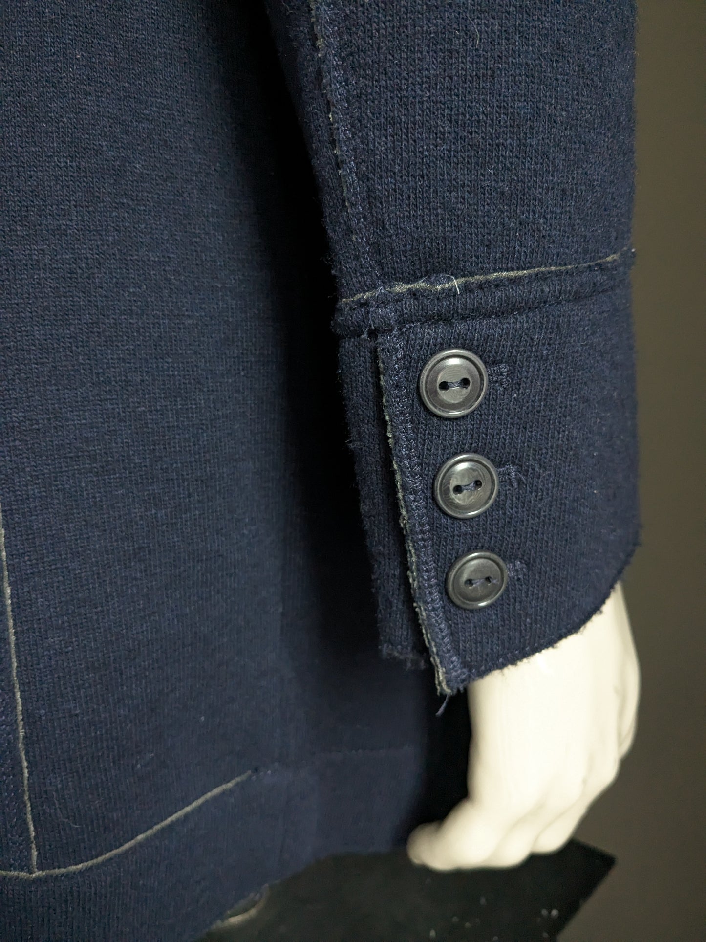 Lana di mezza lunghezza di Marc O'Polo tra la giacca con bottoni. Colorato blu scuro. Taglia 50 / M.