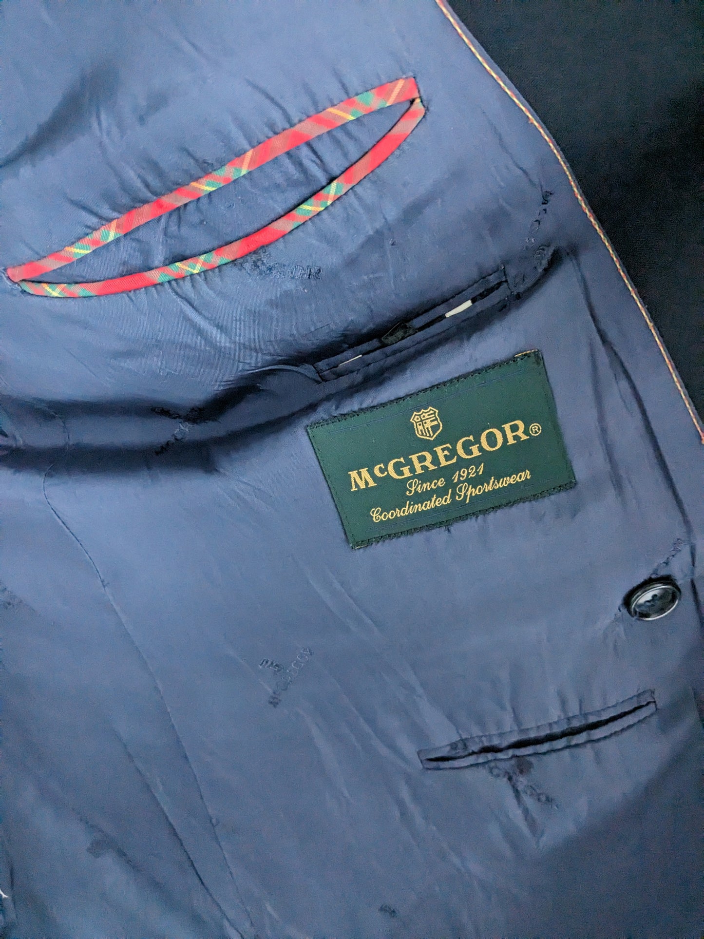 Vintage McGregor woolen Double Breasted jacket dark blue colored. Size 26 (52 / L).