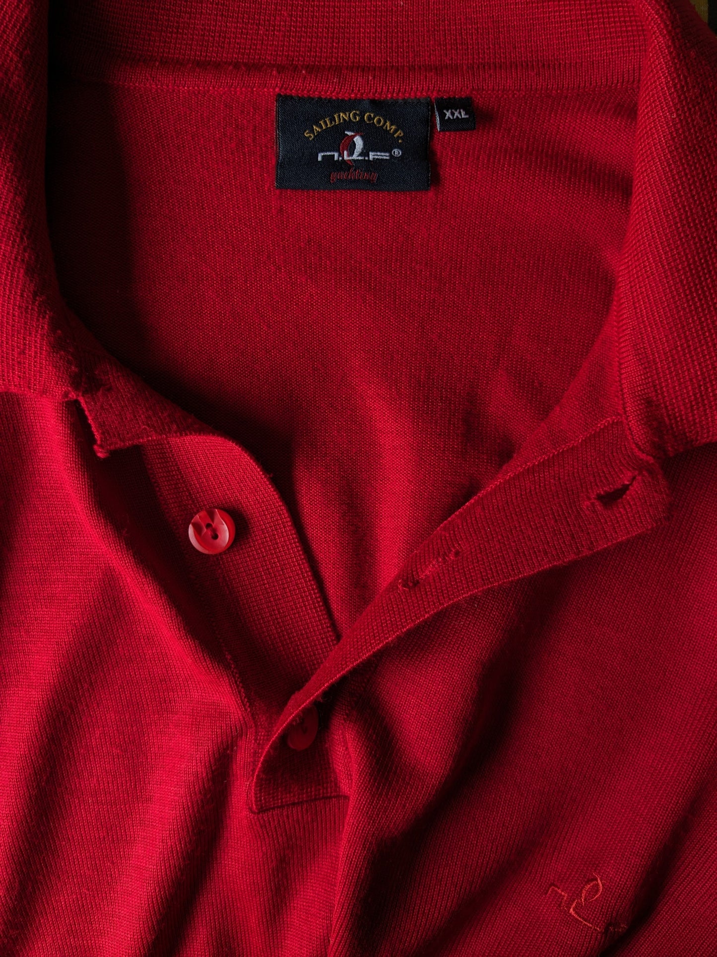 Vintage N.L.F. Maglione polo di lana con bottoni. Rosso colorato. Dimensione 2xl / xxl. 50% lana.