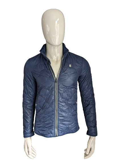 G-Star raw light weight quilted jacket with hidden hood. Dark blue colored. Size S.