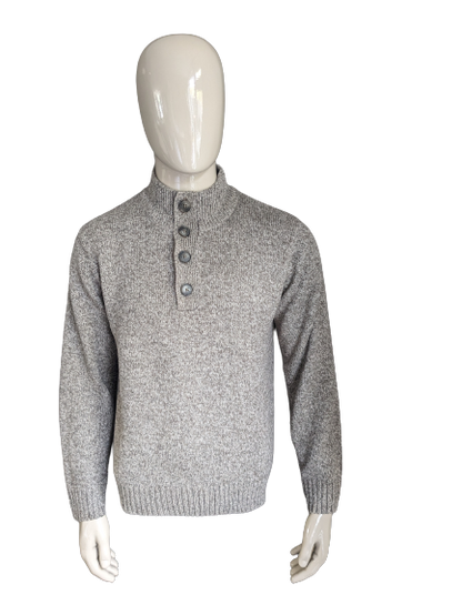 M&S Herrenpullover mit Knöpfen. Beigebraun gemischt. Größe L.