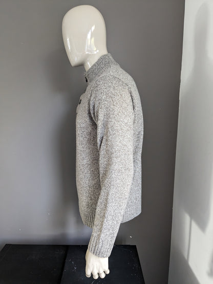 M&S Herrenpullover mit Knöpfen. Beigebraun gemischt. Größe L.