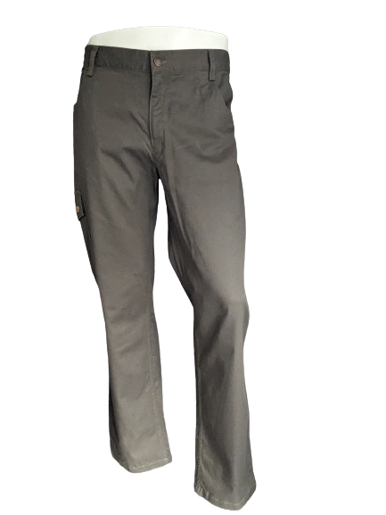 Hubertus Hunting Broek with a pocket side. Dark green colored. Size 29 (58 / XL-2XL)