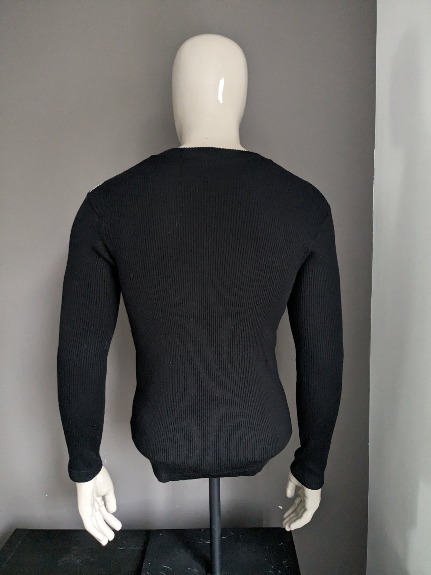 Black rock sweater with buttons. Black white colored. Size XL / L. Stretch.