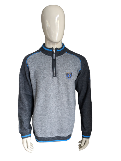 State of Art Wollpullover mit Reißverschluss. Graublau gefärbt. Größe L.