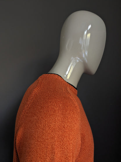 Pull Tommy Hilfiger. Orange mélangée. Taille M.