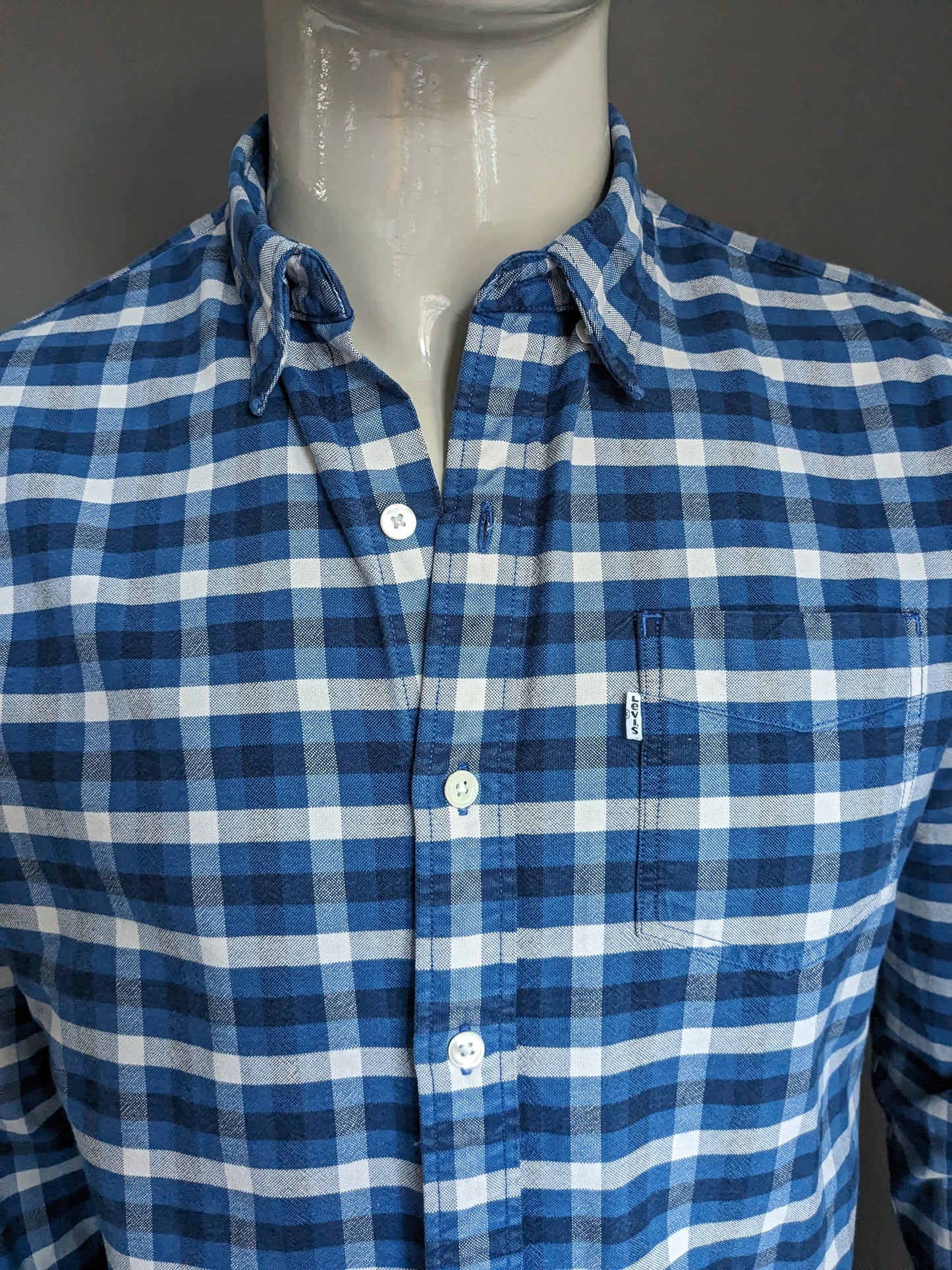 Shirt de flanelle de Levi. Blue blanc à carreaux. Taille L.